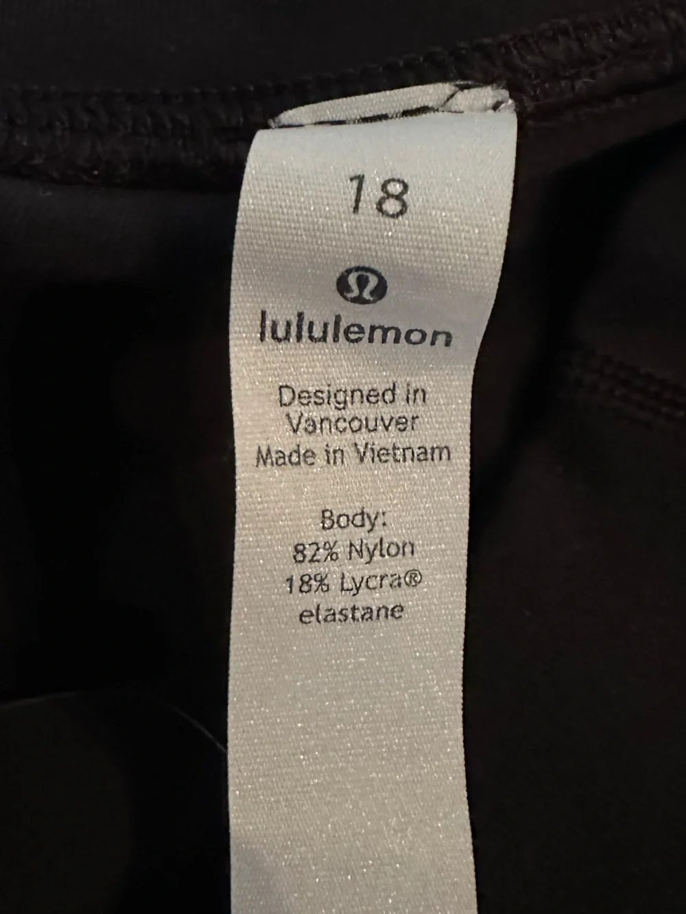 Classic black Lululemon cropped leggings in women’s size 18